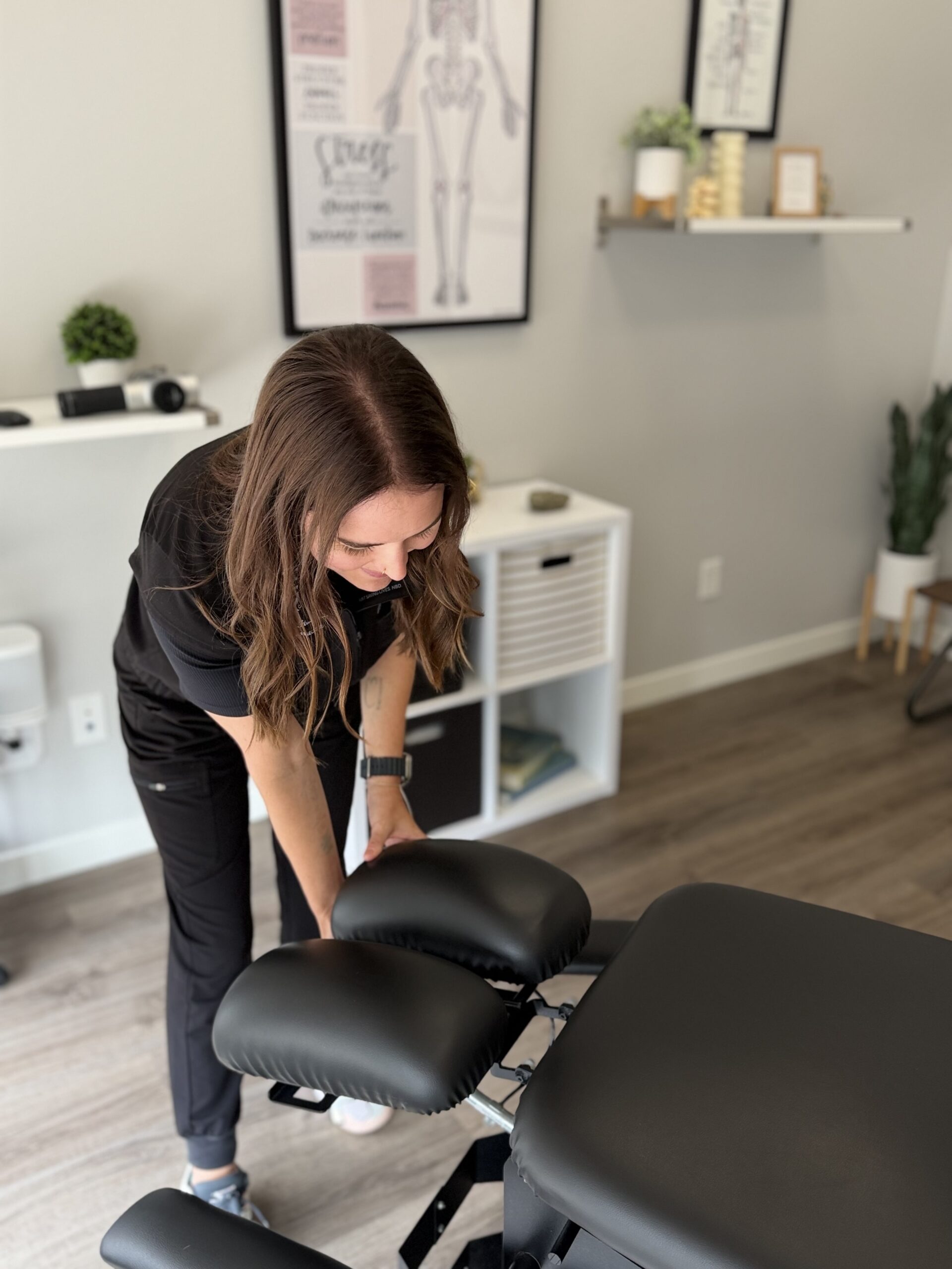 Dr. Heather Flatgard in the chiropractic treatment room
